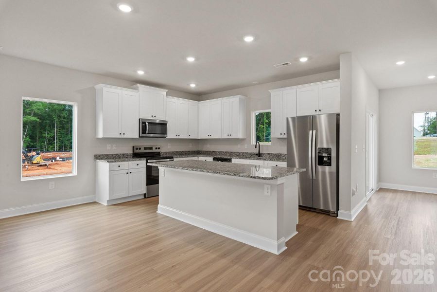 Furnished interior view inside a new home in Ascot Woods, Charlotte (Image 3).