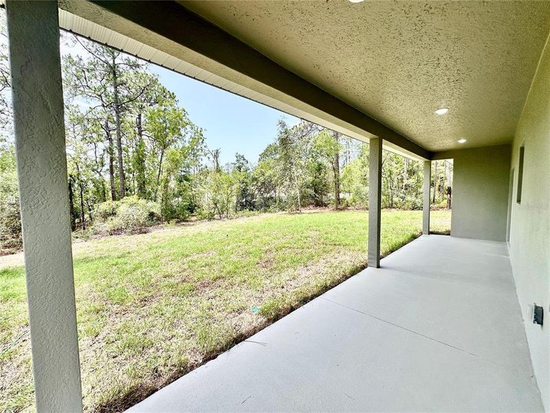 Exterior details and patio area of a home in , Citrus Springs (Image 20).