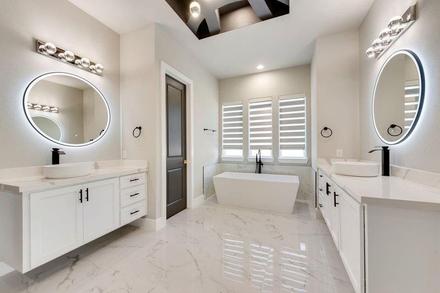 Bathroom with a bathtub and vanity