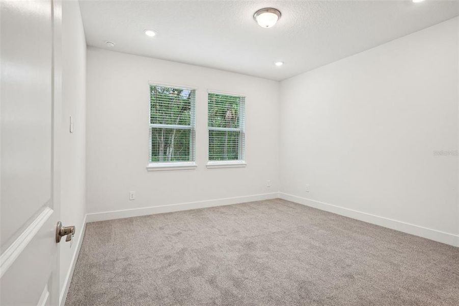 Spacious, unfurnished interior of a new home in Ridgehaven - Signature Series, Ormond Beach (Image 31).