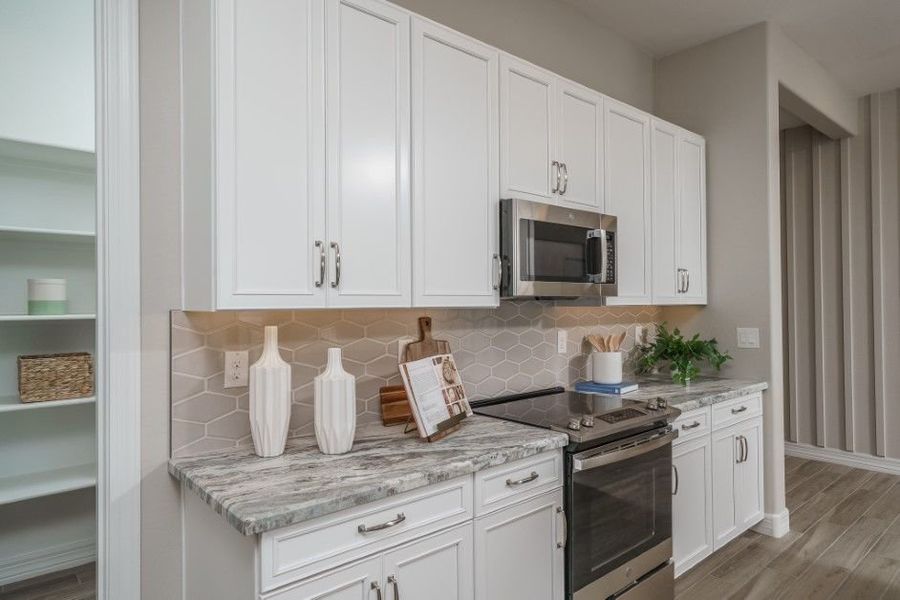 Furnished interior view inside a new home in The Ridge at Sienna Hills, Buckeye (Image 7).