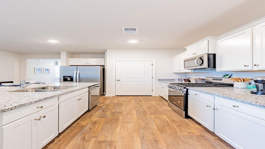 Furnished interior view inside a new home in Pine Hills at Cane Bay, Summerville (Image 8).