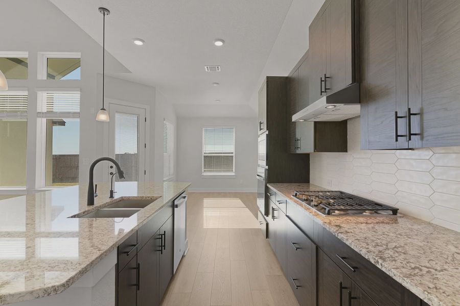 Representative furnished interior of a home built from the Barron by Chesmar Homes in Lariat, Liberty Hill (Image 14).
