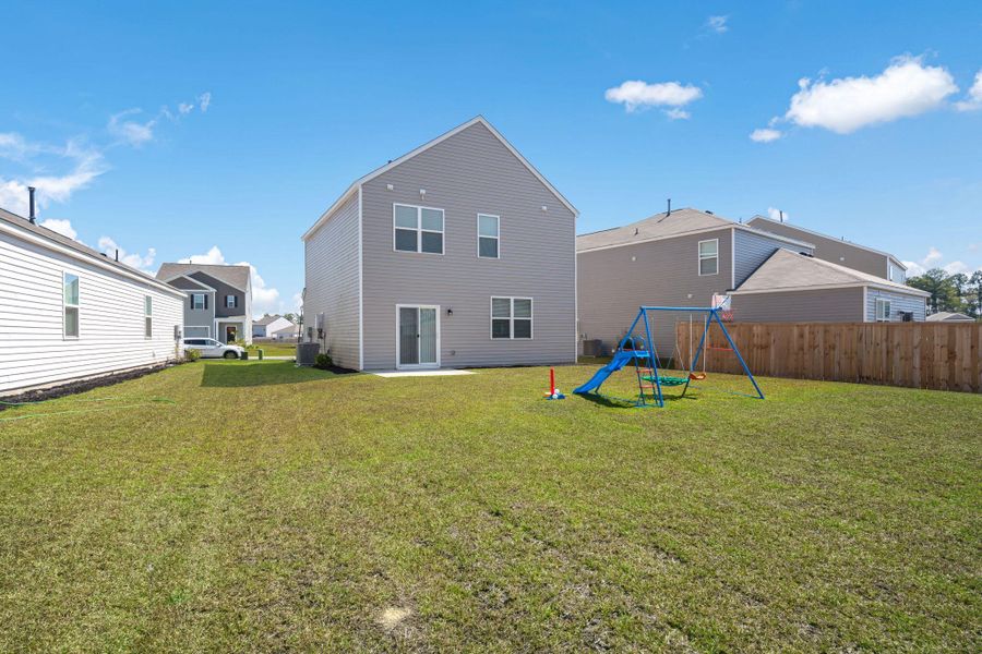 Exterior details and patio area of a home in , Summerville (Image 24).