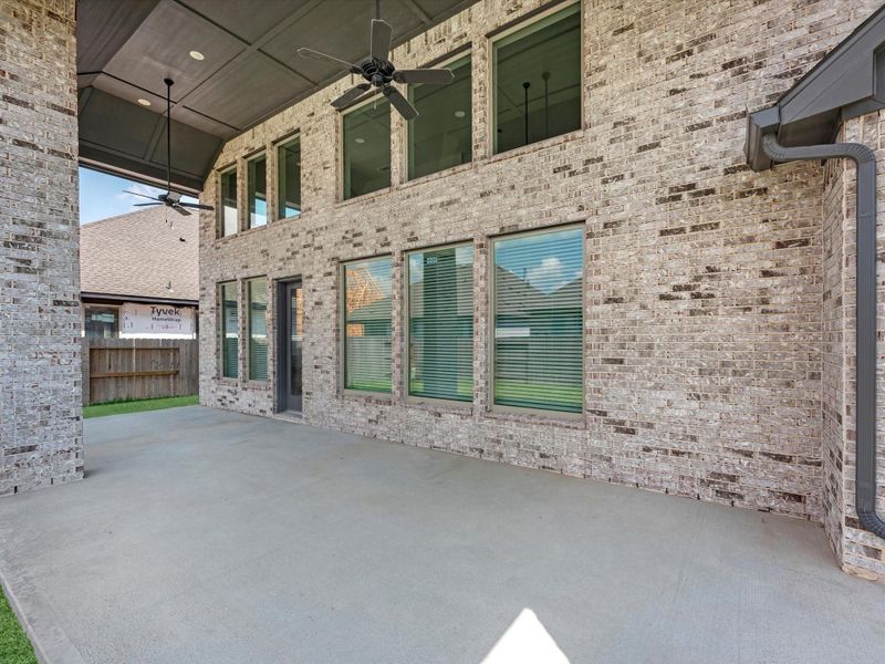 Exterior details and patio area of a home in Coastal Point, League City (Image 3).