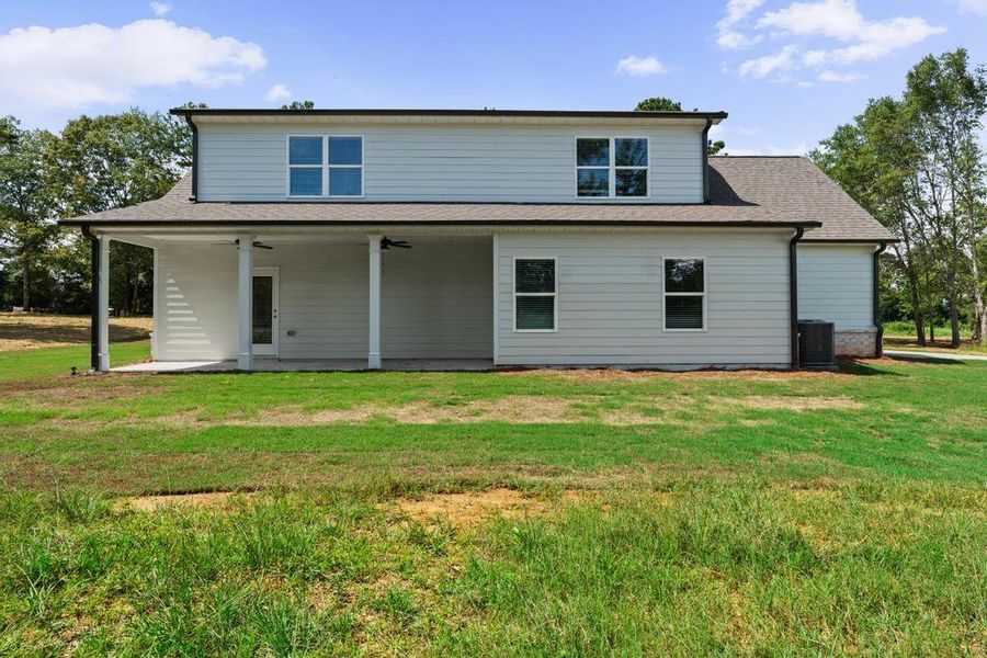 Front exterior of a new home in , McDonough, GA, highlighting curb appeal (Image 18). Front exterior of a new home in , McDonough, GA, highlighting curb appeal (Image 18).