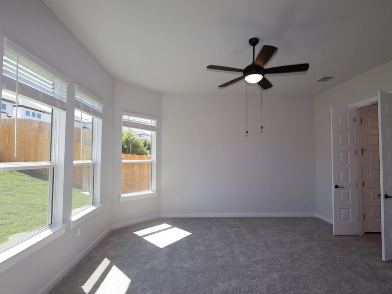 Spacious, unfurnished interior of a new home in Cedar Brook, Leander (Image 27).