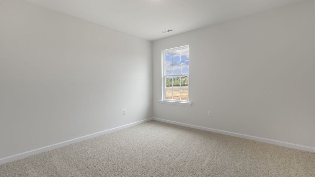 Spacious, unfurnished interior of a new home in The Grove at Matthews Landing, Fuquay Varina (Image 19).