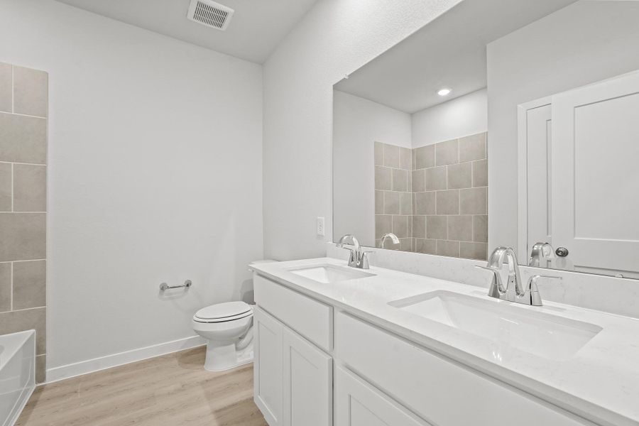 Furnished interior view inside a new home in Sanford Farms, Waller (Image 7).