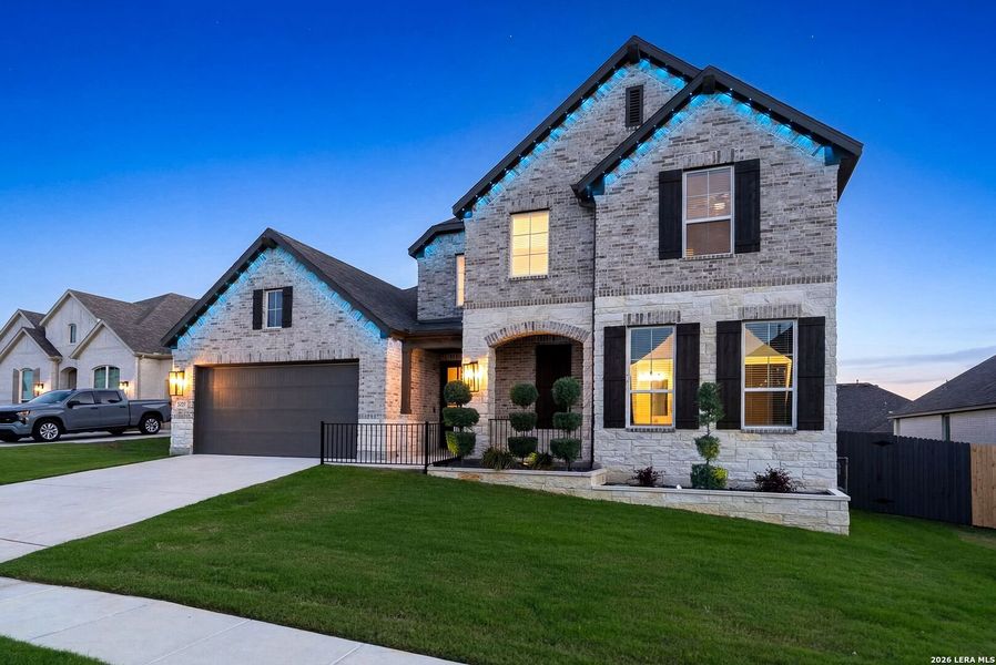 Front exterior of a new home in Ventana, Bulverde, TX, highlighting curb appeal (Image 30).
