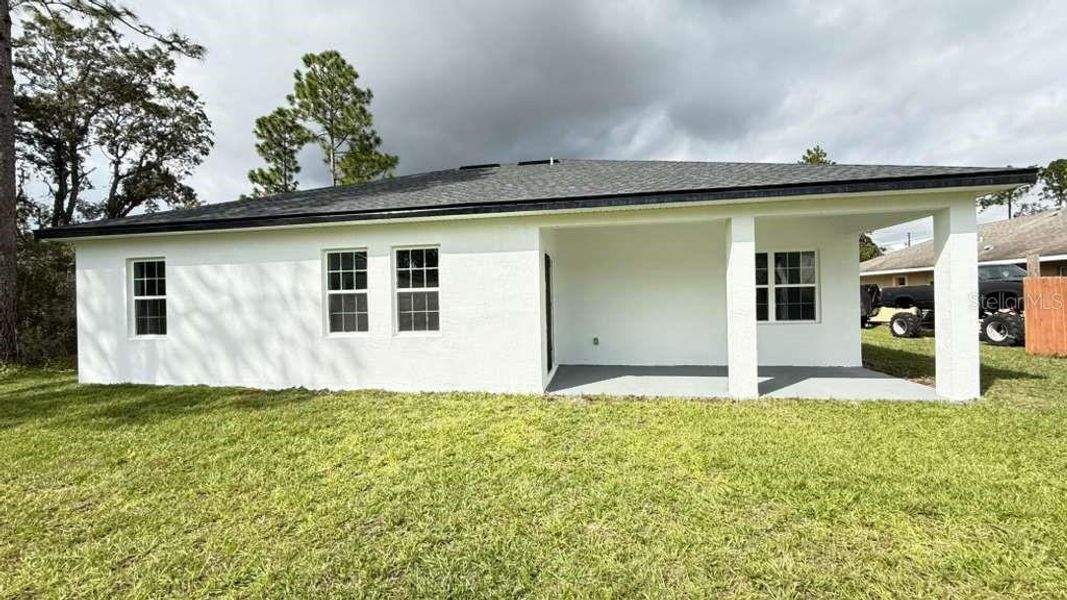 Exterior details and patio area of a home in , Ocala (Image 26).