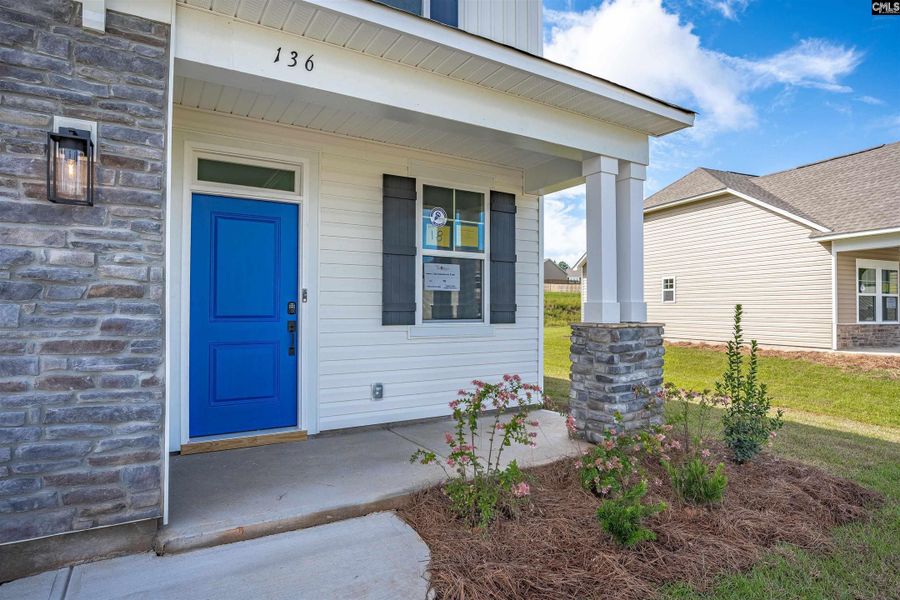 Front exterior of a new home in Rolling Hills, Prosperity, SC, highlighting curb appeal (Image 20).