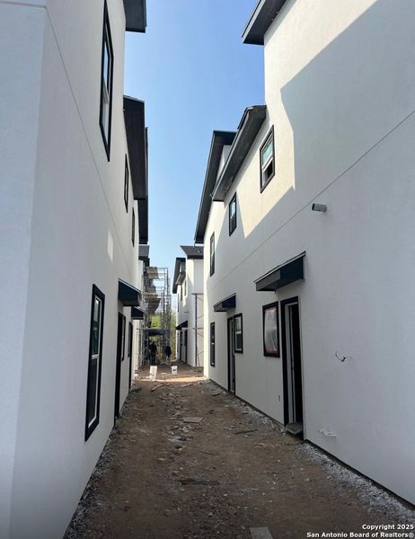 Front exterior of a new home in , Weslaco, TX, highlighting curb appeal (Image 3).