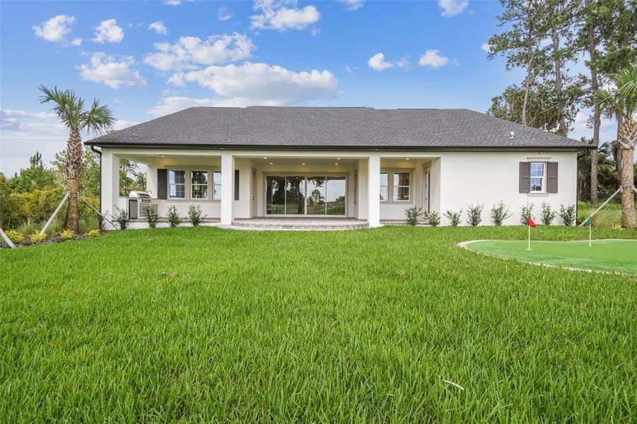Exterior details and patio area of a home in Southern Hills Plantation, Brooksville (Image 26).