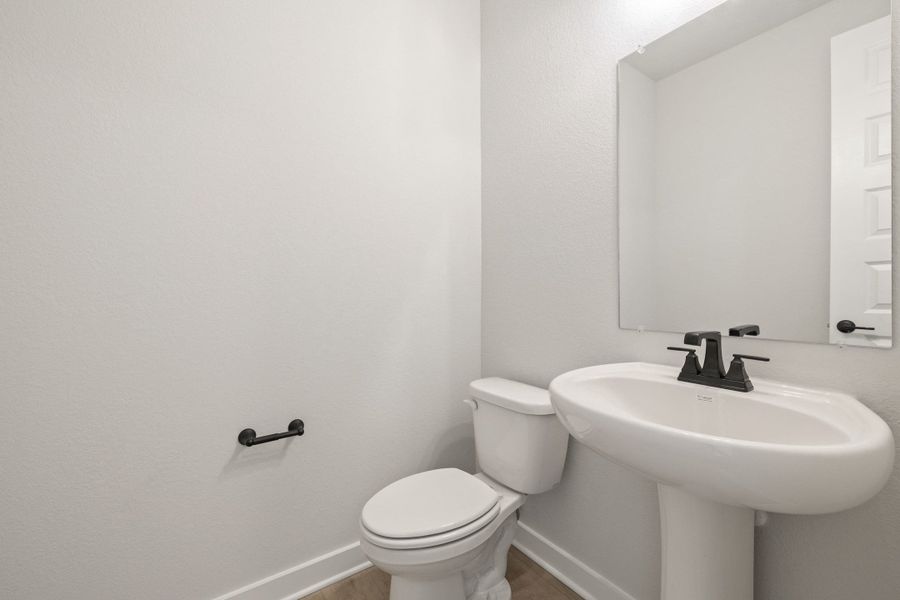 Furnished interior view inside a new home in Heritage, Dripping Springs (Image 8).