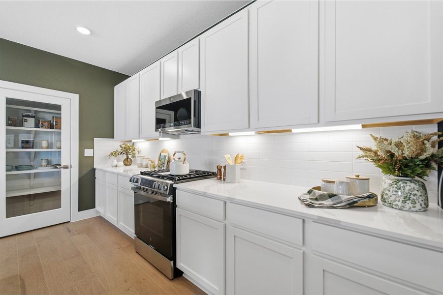 Furnished interior view inside a new home in Sunfield, Buda (Image 17).