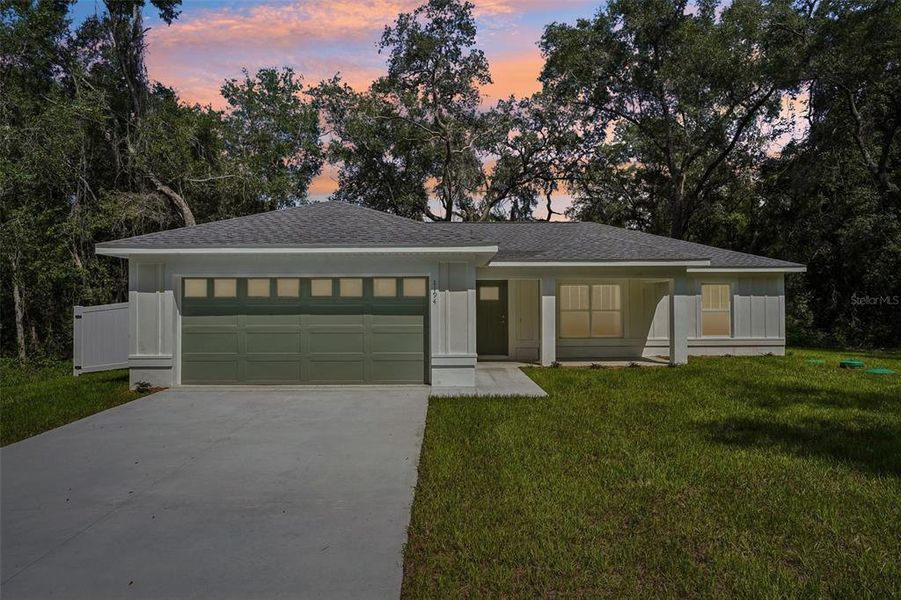 Front exterior of a new home in , Citrus Springs, FL, highlighting curb appeal (Image 23).