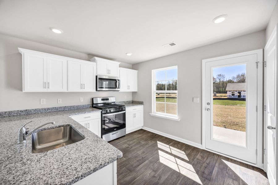 Furnished interior view inside a new home in The Park at Wilkinson, Orangeburg (Image 3). Furnished interior view inside a new home in The Park at Wilkinson, Orangeburg (Image 3).