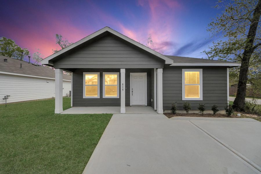 Front exterior of a new home in , Cleveland, TX, highlighting curb appeal (Image 16). Front exterior of a new home in , Cleveland, TX, highlighting curb appeal (Image 16).