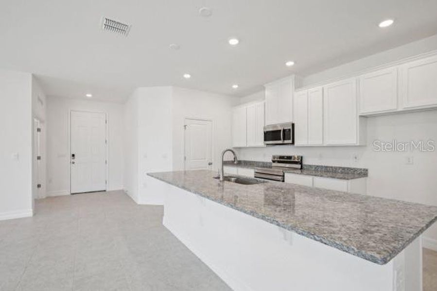Furnished interior view inside a new home in , Punta Gorda (Image 5).