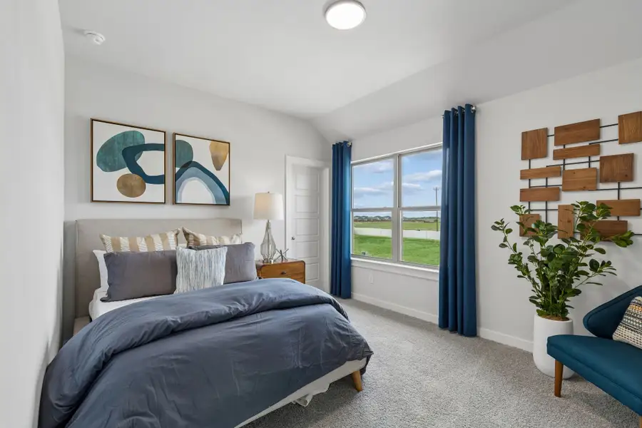 Bedroom in a Madero Winters Model Home in Haslet TX by Trophy Signature Homes