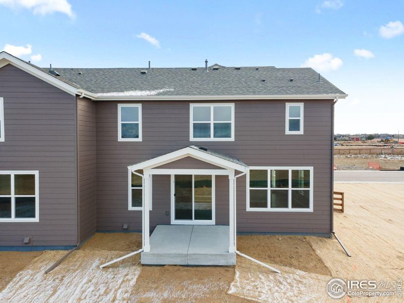 Exterior details and patio area of a home in Cordovan, Longmont (Image 3).