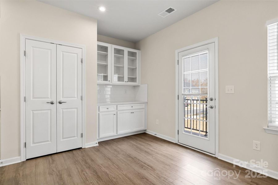 Kitchen pantry and extra cabinets space/ coffee station