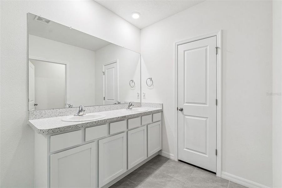 Furnished interior view inside a new home in Westgate at Avalon Park, Wesley Chapel (Image 74).