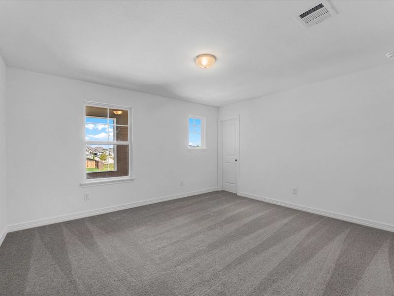 Secondary bedroom. Sample product photo. Actual exterior and interior selections may vary by homesite. Photo may be virtually staged.