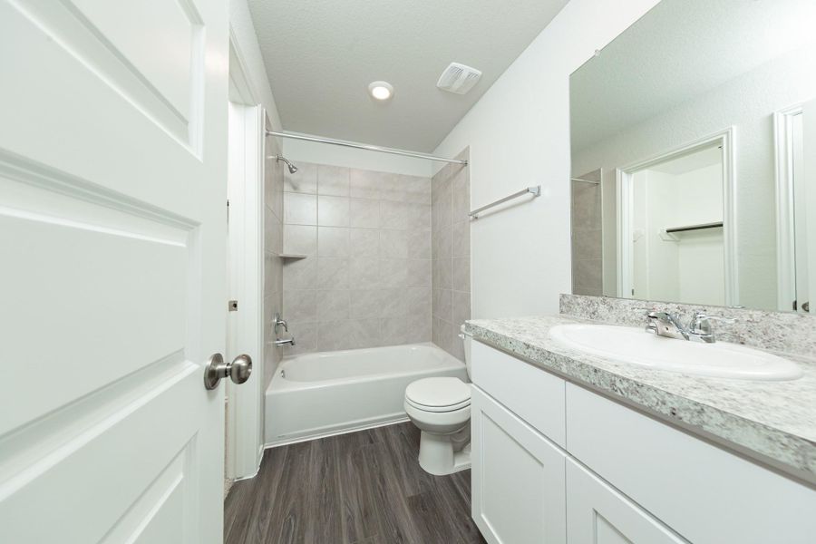 Furnished interior view inside a new home in Townsend Reserve, Splendora (Image 6).