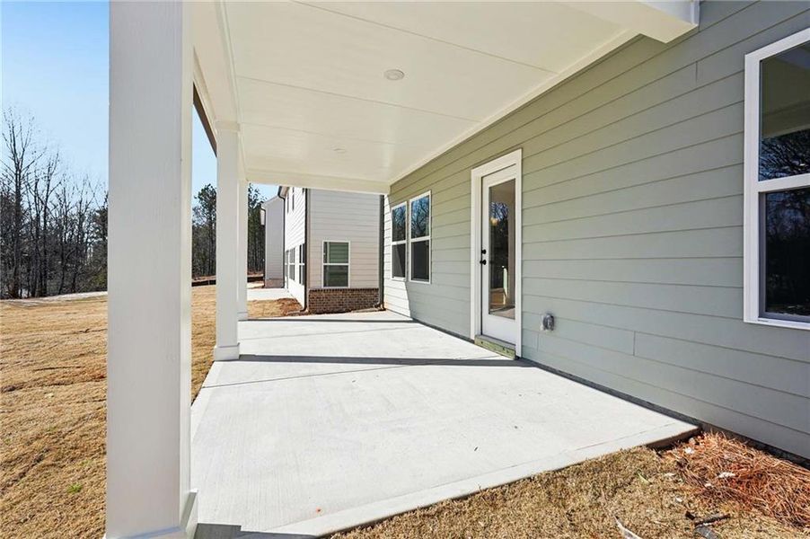 Exterior details and patio area of a home in Arbors at Richland Creek, Buford (Image 29). Exterior details and patio area of a home in Arbors at Richland Creek, Buford (Image 29).