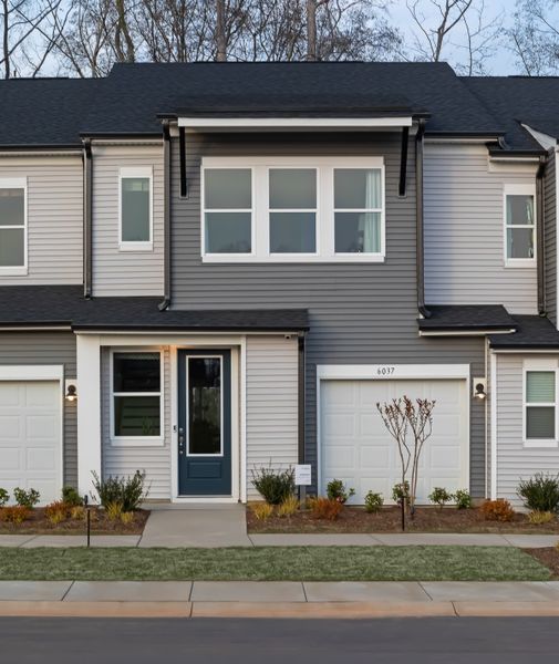 Front exterior of a new home in Fifteen 15 Cannon, Charlotte, NC, highlighting curb appeal (Image 14).