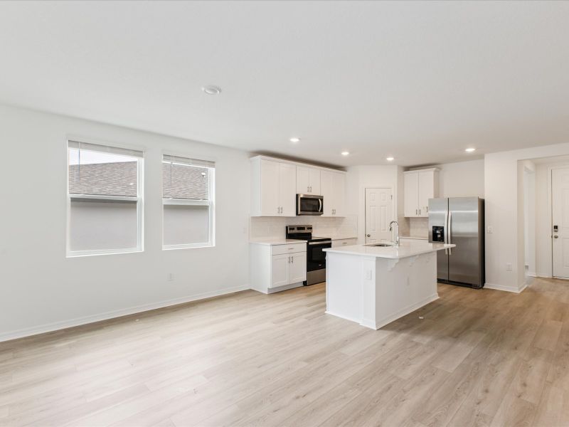 Dining room in the Daphne floorplan at 2343 White Tail Street