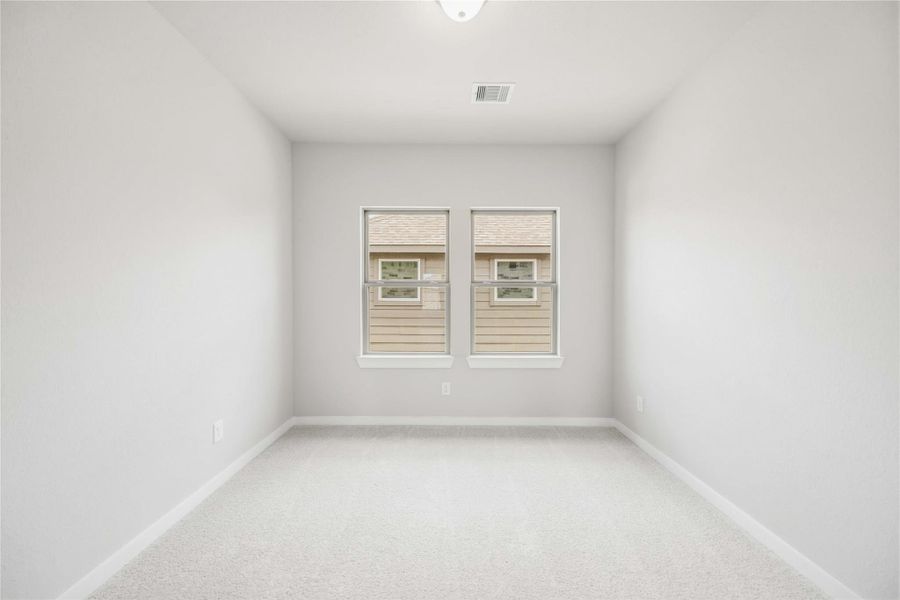 Spacious, unfurnished interior of a new home in Sunterra 40, Katy (Image 19).