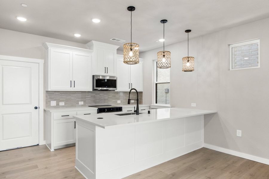 Furnished interior view inside a new home in Wildridge, Oak Point (Image 11).