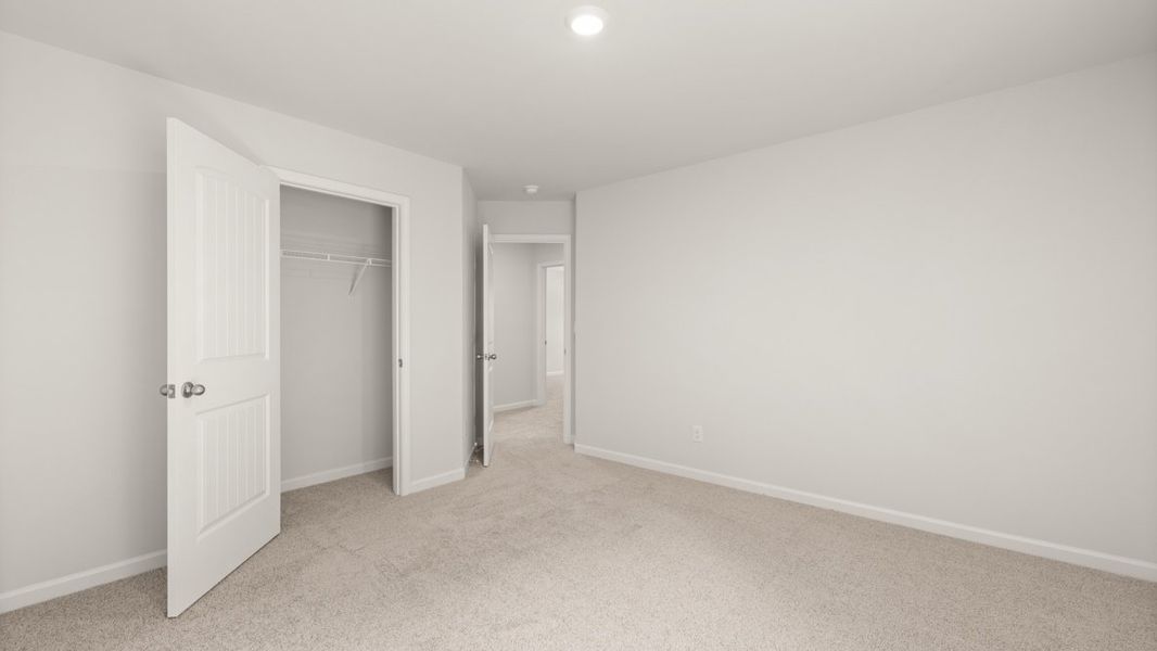 Representative unfurnished interior of a home built from the Grayson by D.R. Horton in Holland Estates, Powder Springs (Image 30).