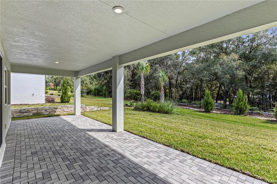 Exterior details and patio area of a home in Cresswind at Hammock Oaks, Lady Lake (Image 3).