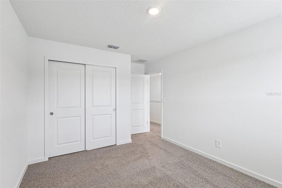 Spacious, unfurnished interior of a new home in Flagler Village - Signature Series, Palm Coast (Image 32). Spacious, unfurnished interior of a new home in Flagler Village - Signature Series, Palm Coast (Image 32).