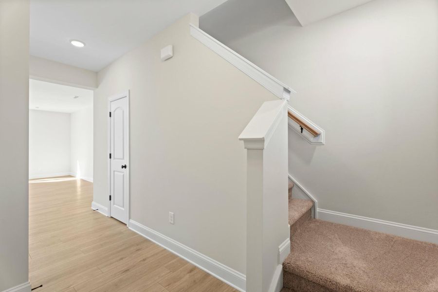 Spacious, unfurnished interior of a new home in Cottages at Piper Village, Trinity (Image 30).