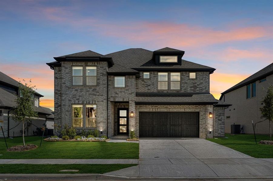 Front exterior of a new home in Devonshire, Forney, TX, highlighting curb appeal (Image 21).