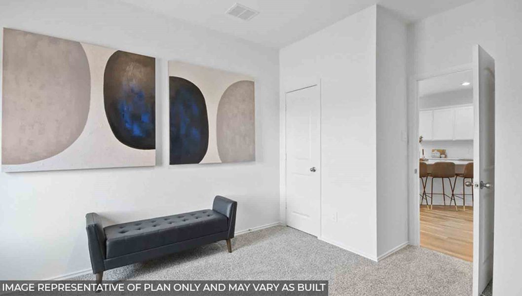 Furnished interior view inside a new home in Sunterra, Katy (Image 12).