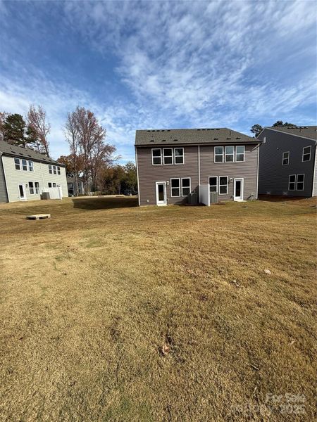 View of back of house. 9A is on the left View of back of house. 9A is on the left