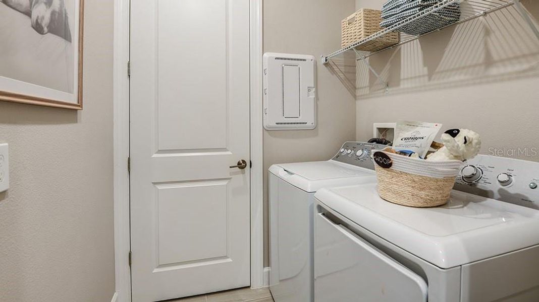 Furnished interior view inside a new home in Esplanade at McKinnon Groves, Winter Garden (Image 6).