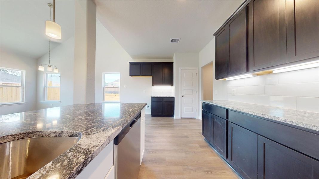 Furnished interior view inside a new home in Lexington Heights 50', Willis (Image 13).