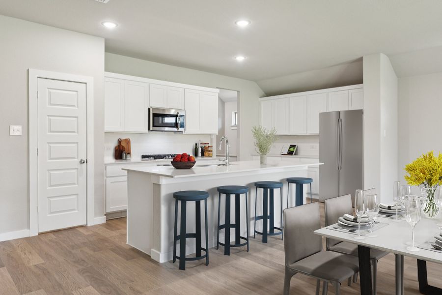 Kitchen in the Heisman home plan by Trophy Signature Homes – REPRESENTATIVE PHOTO Kitchen in the Heisman home plan by Trophy Signature Homes – REPRESENTATIVE PHOTO