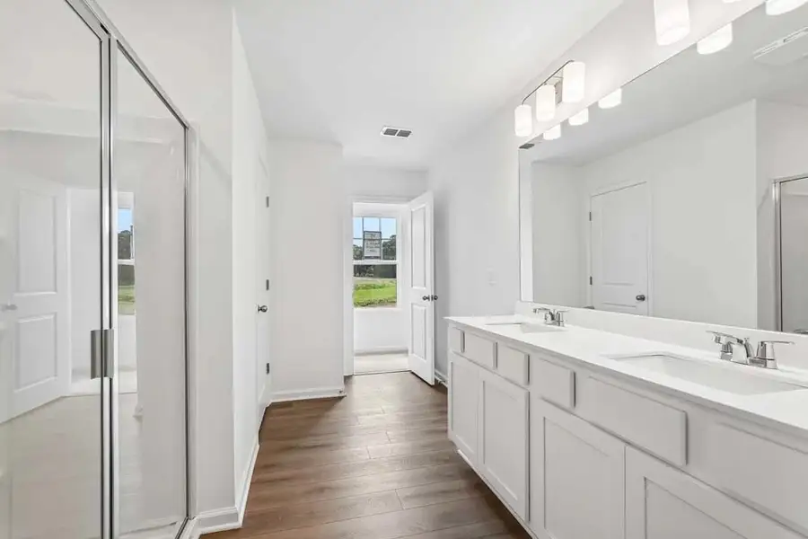 Primary Bathroom Featuring Timeless Collection Finishes