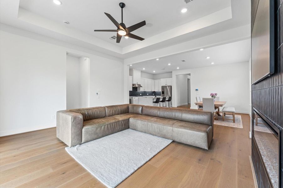 Engineered wood floors can be found throughout the home - no carpet.