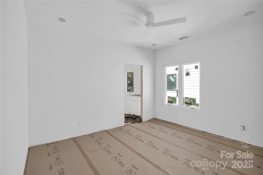 1st guest bedroom, shares a Jack and Jill bathroom with the other guest bedroom