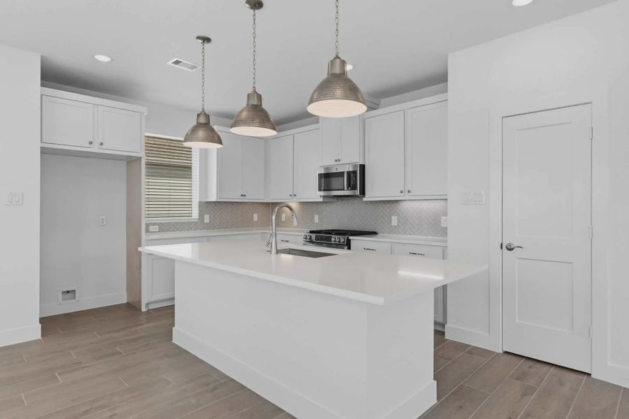 Representative furnished interior of a home built from the Oakdale by Chesmar Homes in Bridgeland, Elgin (Image 7).
