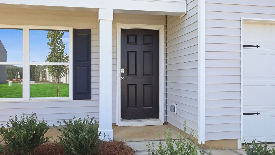 Exterior details and patio area of a home in Bynum Farms, Farmville (Image 4).